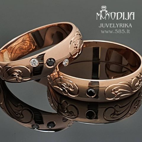 Raudono aukso vestuviniai žiedai su rankų darbo graviūra
Svoris: 10g
Briliantai: 2vnt*0.03ct-2mm, 2vnt*0.015ct-1.5mm
Darbo kaina: 350€
Kategorija: Klasikiniai
Plotis: 5mm ir 5mm